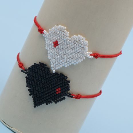 Hot-Saling Reisperlen handgewebte Liebesquaste ethnischen Stil Armband für Frauen's discount tags