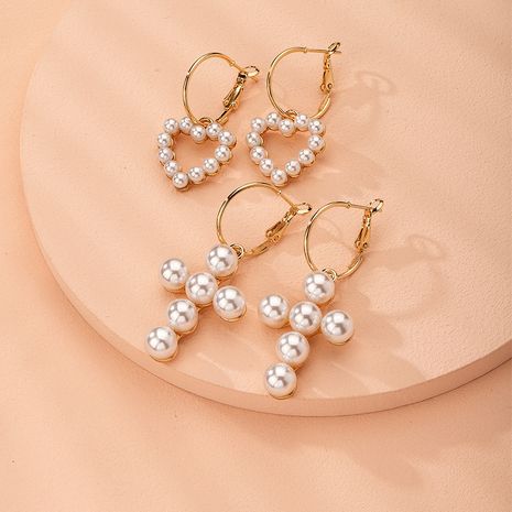 Korea pearl 925 silver needle love cross exquisite earrings wholesale nihaojewelry's discount tags