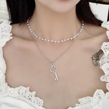 Double-layer pearl key women's clavicle chain necklace set's discount tags