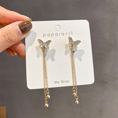 Aiguille en argent 925 une paire de longues boucles d'oreilles en alliage coréen avec pompon de fée papillon