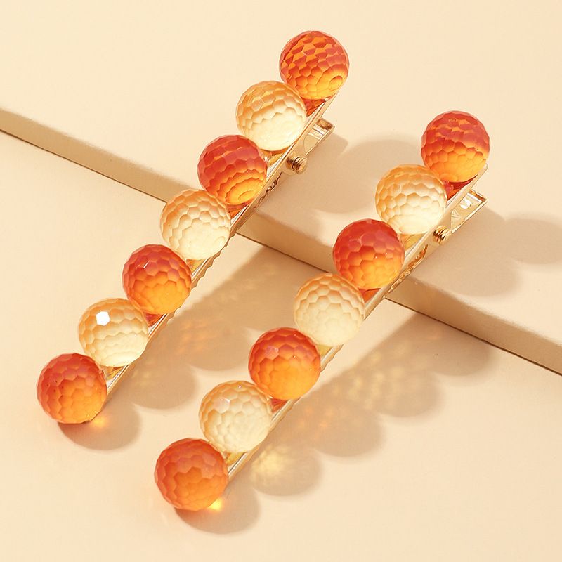 Horquilla de bola de color caramelo de Corea pinza de pelo lateral simple horquilla coreana al por mayor