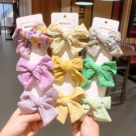 Accesorio para el cabello con clip de prensa de lazo de tela para niños de la serie floral a cuadros coreanos's discount tags