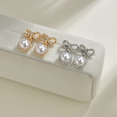 S925 silver needle Korea sweet and cute fairy fashion bow pearl alloy earrings wholesale