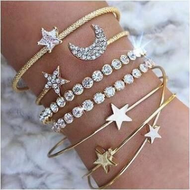 mode nouveau bracelet en alliage de quatre pièces en cristal de diamant simple étoile lune's discount tags