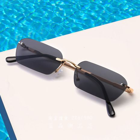 Fashion small frame rimless new hip-hop style trendy oval sunglasses's discount tags
