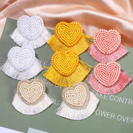 exaggerated peach heart-shaped handmade rice bead short fabric tassel earrings wholesale's discount tags