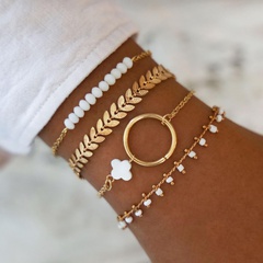 Fashion four-leaf clover white tassel hand ornament pattern bracelet set