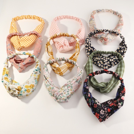 new retro floral elastic cross  hair band's discount tags