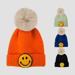 Neue koreanische Version von Kindern Herbst und Winter warm Jungen Mädchen Baby Strick mütze Lächeln Woll mütze Baby Haar Ball