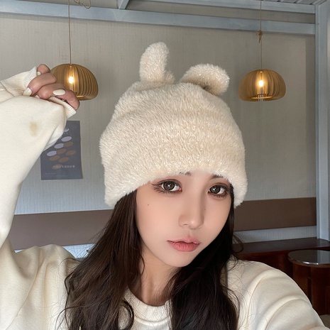 black hat Korean fashion solid color rabbit ear plush ear protection autumn and winter hat's discount tags