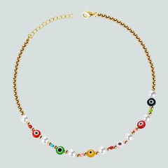 Collier de perles d'imitation de perles de riz colorées de style ethnique rétro yeux du diable collier de perles fait main personnalisé