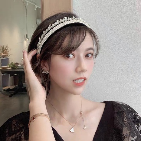 Korean version of the fashion super flash rhinestone headband retro pearl beads winding hairpin's discount tags
