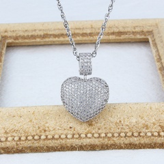 nouveau collier de diamants en forme de coeur stock féminin approvisionnement direct simple pendentif d'amour creux rotatif en acier au titane