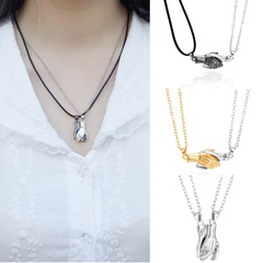 Les aimants de collier de couple de ventes directes d'usine attirent une paire de colliers de chaîne de clavicule masculins et féminins accessoires d'argent sauvage en gros