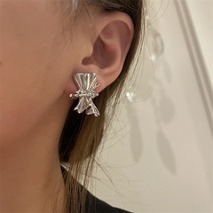 Folded earrings niche design bowknot personality silver needle earrings Korean irregular earrings