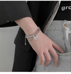 Korean version double layered monster bracelet reflective pearl stitching titanium steel bracelet cute accessories