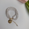 retro metal imitation pearl person head round brand bracelet necklace elegant braceletpicture21