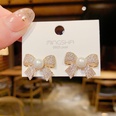 Pendientes de botn de lazo con micro incrustaciones coreanas pendientes de perlas exageradas femeninas al por mayorpicture15