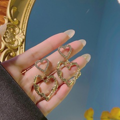 Korean diamond hollow heart earrings fashion personality metal texture heart earrings
