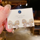 Pendientes de botn de lazo con micro incrustaciones coreanas pendientes de perlas exageradas femeninas al por mayorpicture12