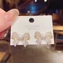 Pendientes de botn de lazo con micro incrustaciones coreanas pendientes de perlas exageradas femeninas al por mayorpicture14
