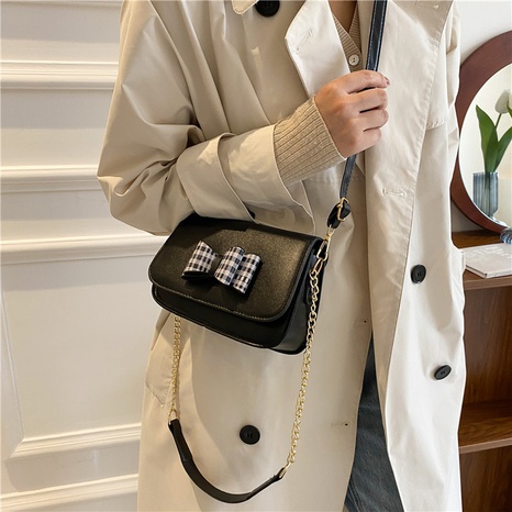 Korean version of the trendy messenger bag simple mini fashion bow shoulder bag's discount tags