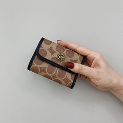 Bolsa de tarjeta pequeña billetera femenina 2021 nueva mini bolsa de tarjeta corta de gran capacidad simple al por mayor