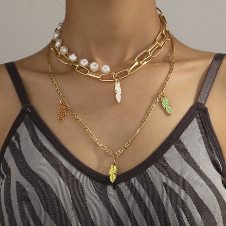 nouvelle mode simple feuille pendentif collier personnalité rétro perle couture feuille collier multicouche's discount tags