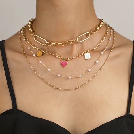 neue Persönlichkeit kreative Farbe Pfirsich Herz Smiley Halskette Pullover Kette Mode mehrschichtige Halskette's discount tags