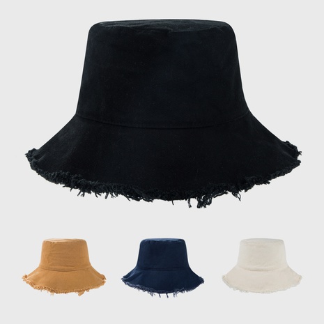 New style distressed solid color hat female autumn and winter all-match casual fisherman hat's discount tags