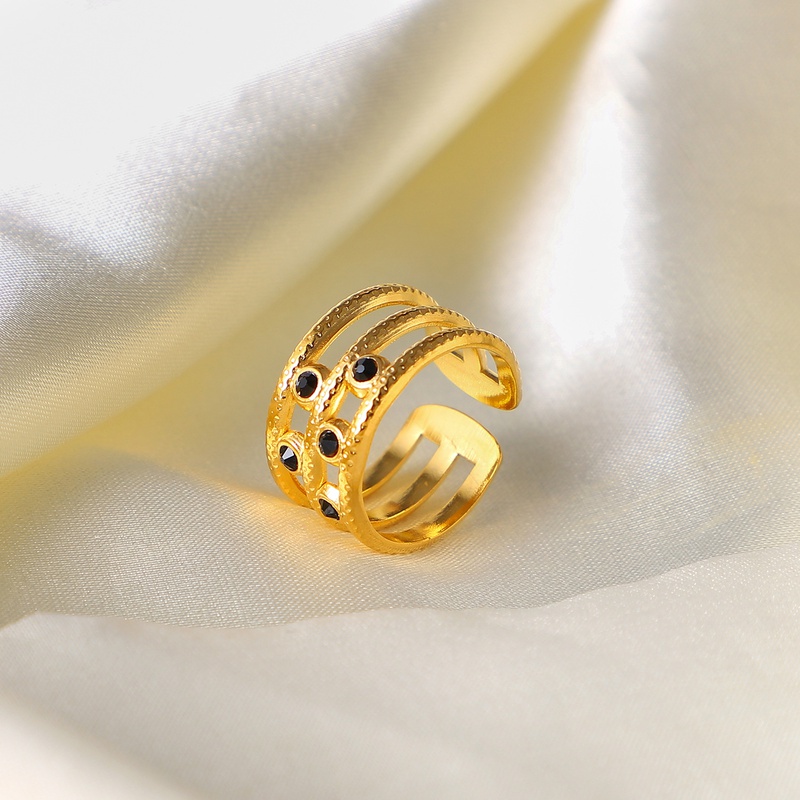 Europischer und amerikanischer 18K vergoldeter Edelstahl 5 schwarze Diamanten dreilagiger offener Ring Modeschmuck