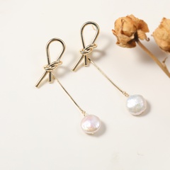 Baroque style earrings in brass with real gold plated metal bow