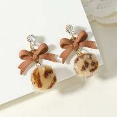 Korean version of the fashion autumn and winter new bow leopard hair ball earrings simple retro niche creative earrings