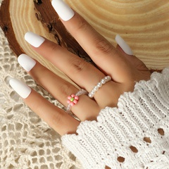 Moda japonesa lindo arroz dulce perlas conjunto de 2 piezas simple retro ins viento frío anillo creativo