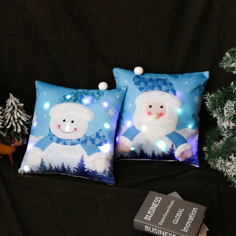 Nuevo producto Santa muñeco de nieve que abraza la funda de almohada luminosa iluminada funda de almohada de Navidad's discount tags