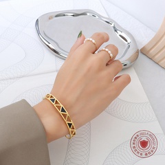 18K gold-plated titanium steel hand jewelry wholesale triangle acrylic hollow bracelet