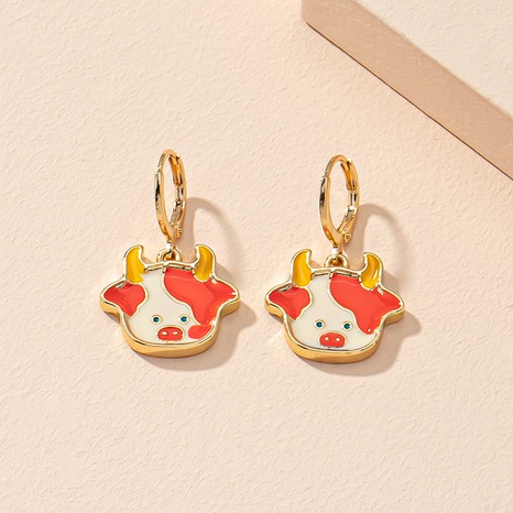 Autumn and winter cartoon zodiac ox dripping oil earrings wholesale's discount tags