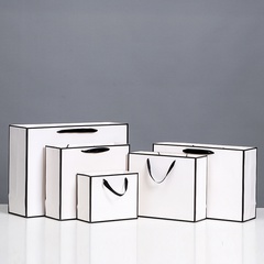 Carton blanc bordure noire sac cadeau vêtements shopping sac fourre-tout en papier kraft sac d'emballage à emporter