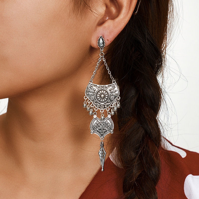 European and American trend long earrings retro bell carved tassels earrings