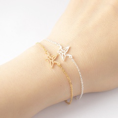 Gold hollow paper crane stainless steel bracelet