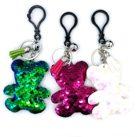 Llavero reflectante de lentejuelas a escala de pez, accesorios de bolso de moda, colgante de oso con borla de campana NHDI473885's discount tags