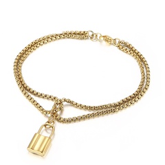 Chaîne de perles de style européen et américain vent rétro pendentif serrure dorée bracelet en acier inoxydable en gros
