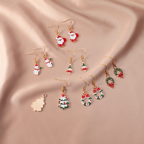 Nueva moda europea y americana Navidad goteando pendientes de Papá Noel joyería al por mayor's discount tags