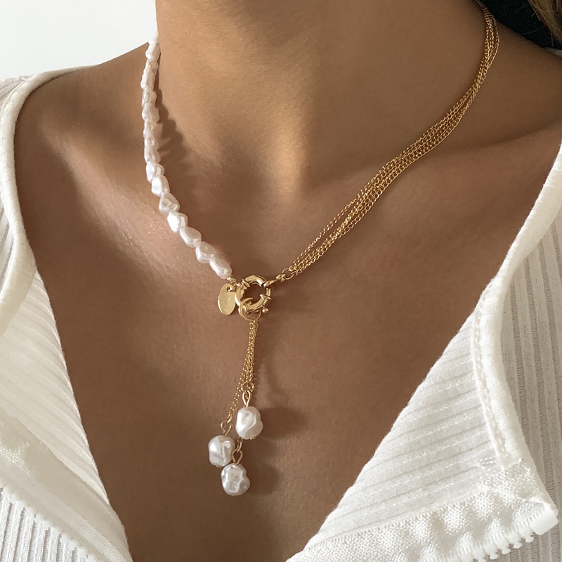 Asymmetrical temperament shaped imitation pearl tassel necklace wholesale