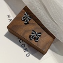 Korean fashion temperament pearl black bow earrings autumn and winter new wild earringspicture8