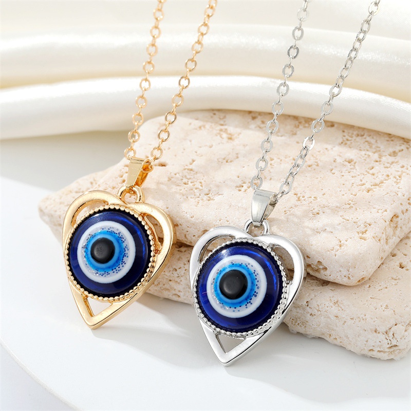 CrossBorder Sold Jewelry Retro Personality Metal Hollow HeartShaped Devil Eye Necklace Turkish Blue Eye Clavicle Chain