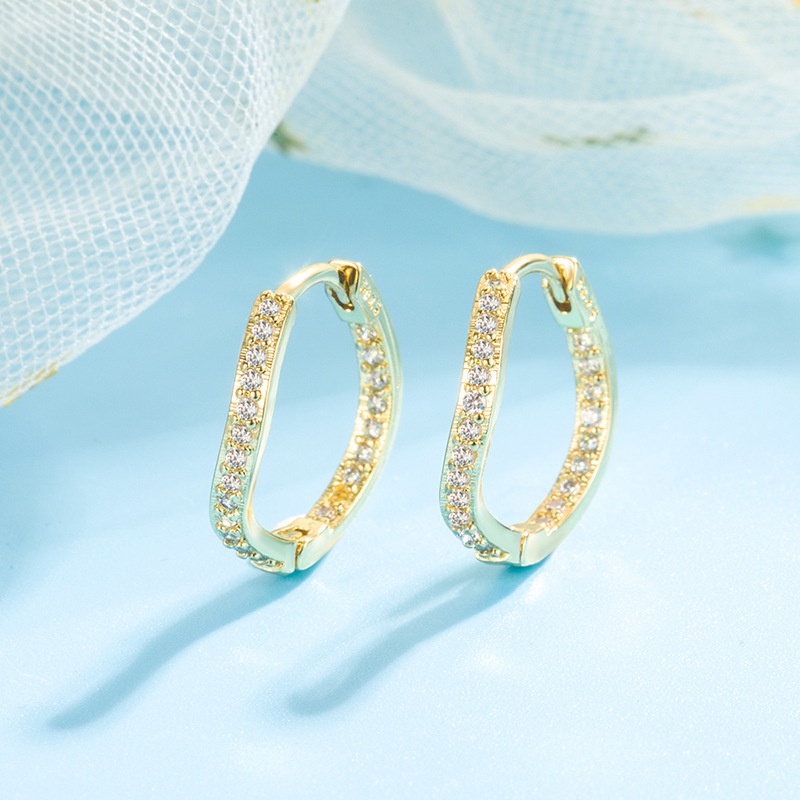 Pendientes ondulados de diamantes europeos y americanos Pendientes de circonita con incrustaciones de oro de 18k para mujer
