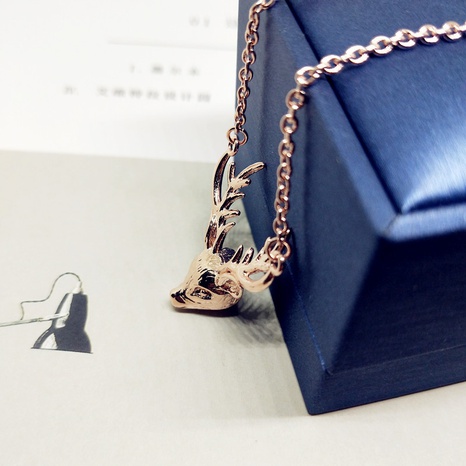 Korea Christmas Deer Necklace Antler Elk Pendant Long Sweater Chain Fashion Jewelry Wholesale's discount tags