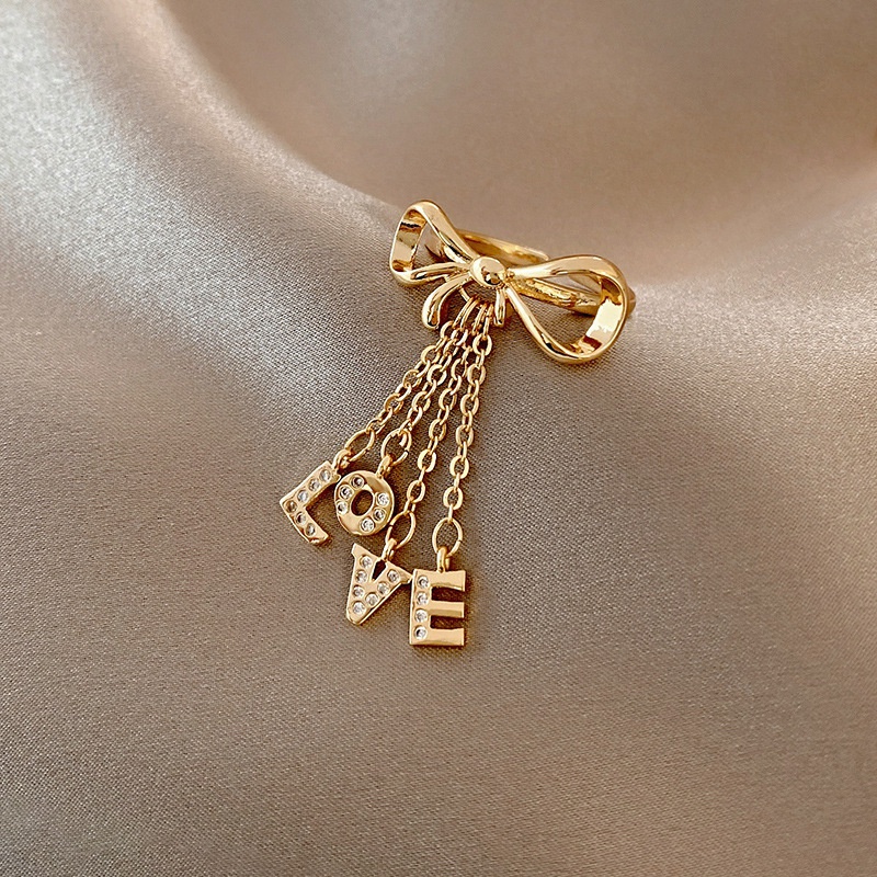 European and American fashion tassel chain letter bow LOVE copper ring
