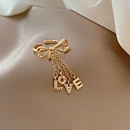 European and American fashion tassel chain letter bow LOVE copper ringpicture9